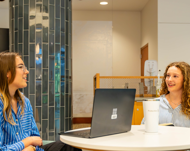 Non-profit employees submitting a grant application to the Protective Foundation.